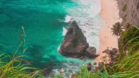 One of the most iconic and famous tropical beach Bali Diamond Beach Stock Footage 297297853