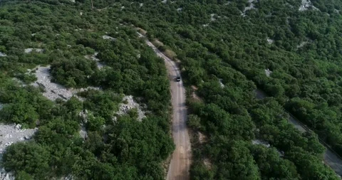 One old 1990 Volkswagen Golf Rabbit Cabriolet rides on a village empty road Video stock 196818341