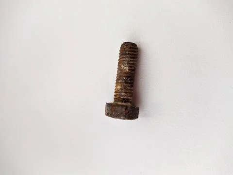One old and rusty bolt on a white background Foto stock
