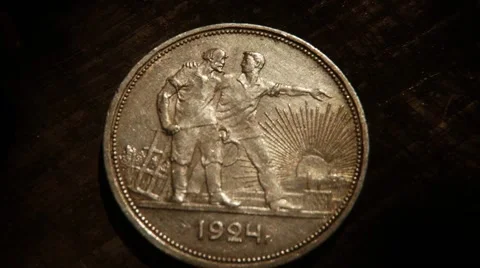 One Old Soviet Silver Ruble Hand Turn Obverse With Peasant and Reverse With Stock Footage 67146217