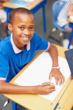 One of our brightest students, working hard as usual. Topview of a confident Stock Photos