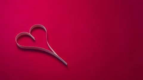 One paper heart on pink background Stock Footage 85698168
