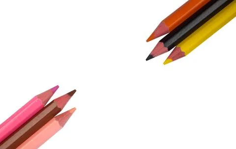One pattern made with Six different colored wood pencil crayons on white pape Stock Photos