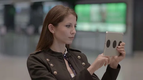 One Person Browsing the Web on Tablet Display Device Stock-Footage 87717505