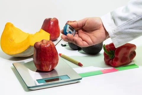 One person performs temperature and weight control in the food industry, fo.. Stock Photos