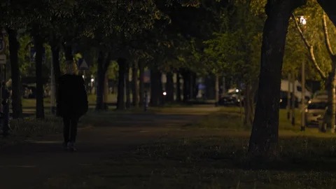 One person walking on the empty sidewalk due to Covid-19 Corona virus pandemic. Stock Footage 128930449