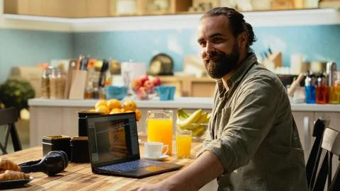 One person working as game programmer with laptop to build virtual 3D world Stock Photos