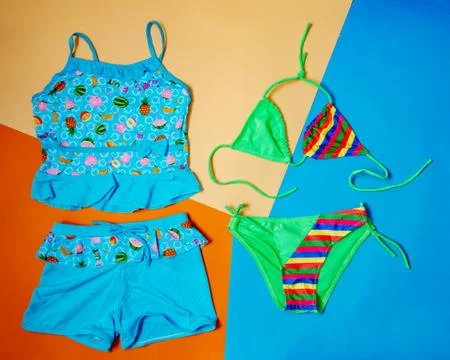 One-piece and separate print swimsuit for girls Stock Photos