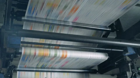 One-piece paper is rapidly rolling through the mechanism Stock Footage 111361213