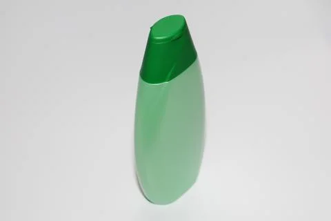 One plastic bottle on a white background. Bottle without label. Stock Photos