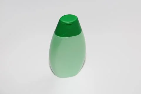 One plastic bottle on a white background. Bottle without label. Stock Photos