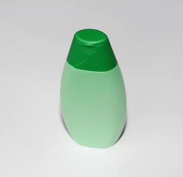 One plastic bottle on a white background. Bottle without label. Stock Photos