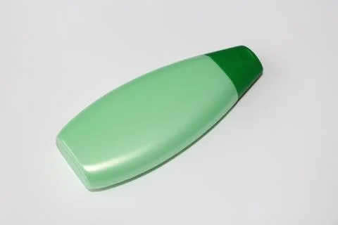 One plastic bottle on a white background. Bottle without label. Stock Photos