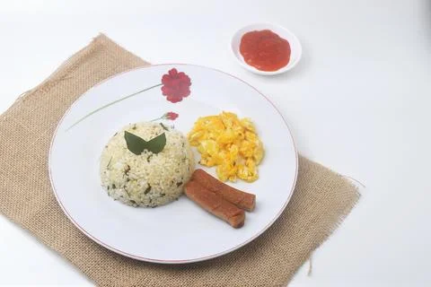 One plate of lime leaf fried rice made from rice mixed with lime leaves Stock Photos