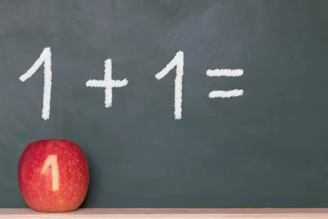 One plus one on a blackboard Stock Photos