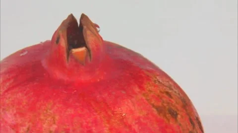 One pomegranate  rotating in front of camera Stock Footage 44323871