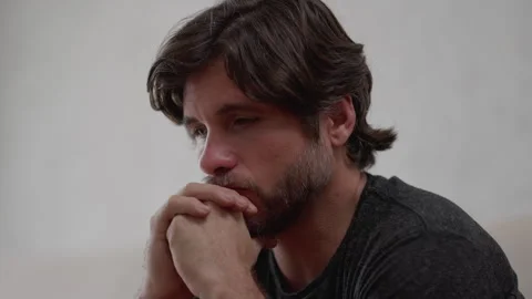 One preoccupied young man thinking deeply about life problematic issues. Wo.. 스톡 동영상 254513724