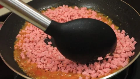 One put on sliced ​​beef. make sauce for spaghetti Stock Footage 334268600