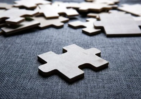 One puzzle piece against the background of other pieces Foto stock