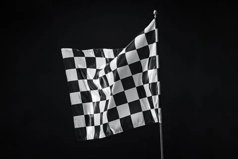 One racing checkered flag on black background 스톡 사진