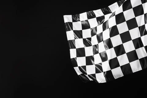 One racing checkered flag on black background, space for text Stock Photos