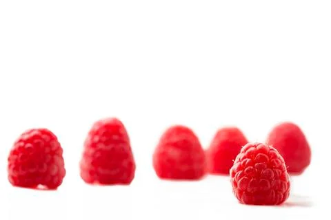 One raspberry and five Stock Photos