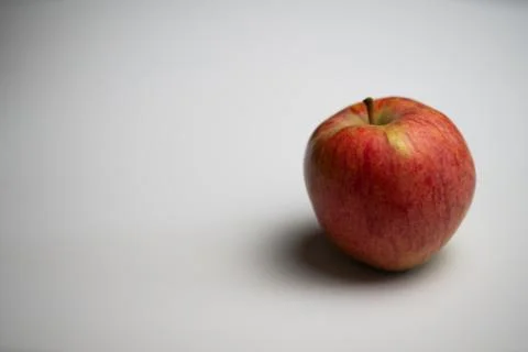 One red apple flat lay white background Stock Photos