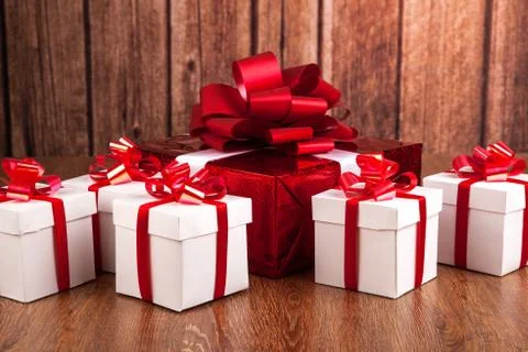 One red gift box white gift boxes Stock Photos