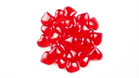 One red heart explodes and there are many hearts Stock Footage 147331962