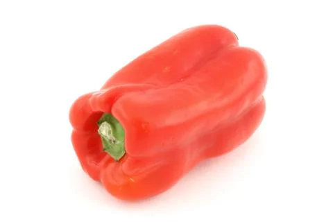 One red pepper on white background Stock Photos