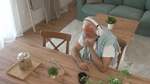One senior man use digital tablet to watch movie or have a video call Stock Footage 250347106