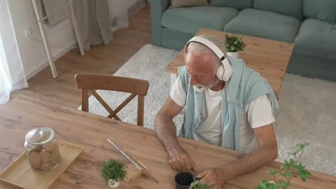 One senior man use digital tablet to watch movie or have a video call Stock Footage 250347248