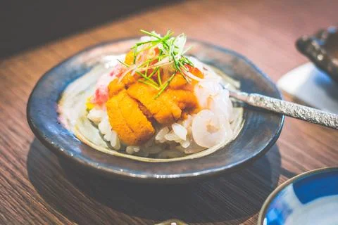 One serving of Bara Chirashi with uni sea urchin, tuna and ikura salmon roe Stock Photos