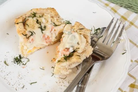 One serving of bread pudding with a liquid egg in the context of Stock Photos