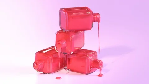 One shade of red nail polish spilled from stack of glass bottles. 4K HD Stock Footage 119986934