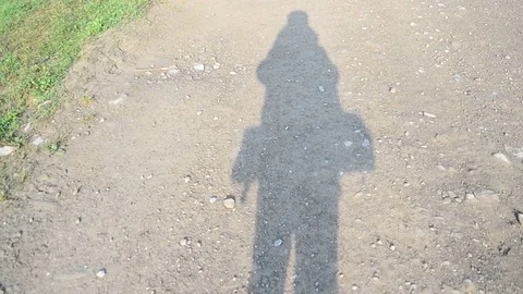 One shadow of a man hiking Stock-Footage 70814977