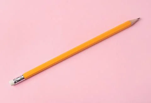 One sharp graphite pencil on pink background, top view Stock Photos
