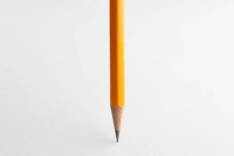 One sharp graphite pencil on white background, closeup. Space for text 스톡 사진