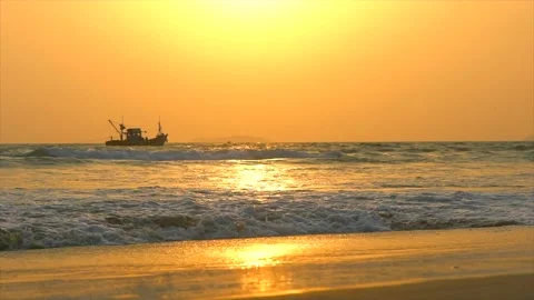 One ship crossing in Sun set time in goa beach Stock Footage 216570930