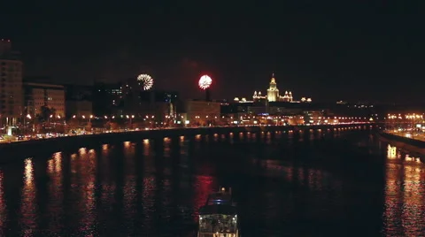 One ship Float On River At Night, Msu Building And Firework On The Background. Stock Footage 54176751