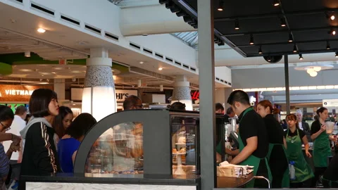 One side of barista working inside Starbucks store with 4k resolution. Stock Footage 128506598