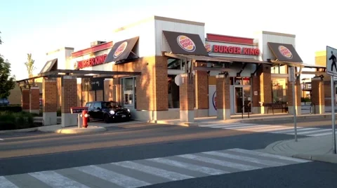 One side of  Burger King drive thru and front door Stock Footage 51387383