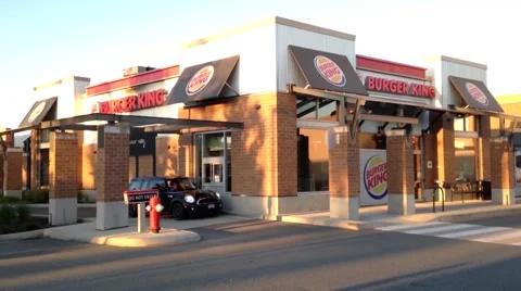 One side of  Burger King drive thru and front door Stock Footage 53098282