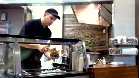 One side of check out counter at New York Fries store Stock Footage 47830168