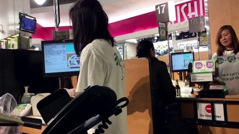 One side of check out counter inside T&amp;T supermarket with 4k resolution Stock Footage 70300763