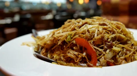 One side of fried noodle with smoke inside Chinese restaurant Stock Footage 64056300