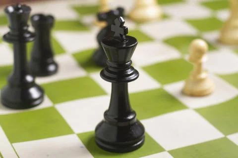 One side light on Black king chess piece. close up photo Foto stock