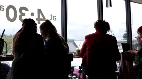 One side of people drinking coffee inside Starbucks store Stock Footage 76388083