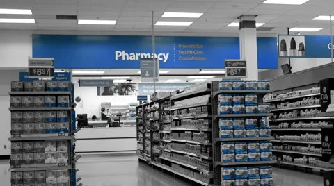 One side of people picking up their prescription medicine Video stock 68949712