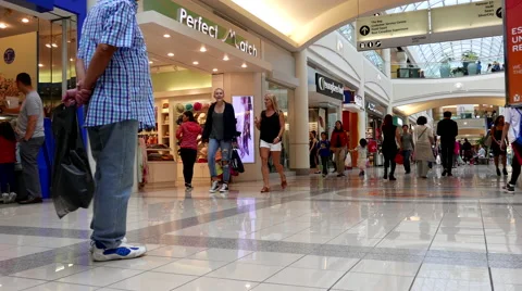 One side of people shopping inside Burnaby shopping mall with 4k resolution Video stock 66372582